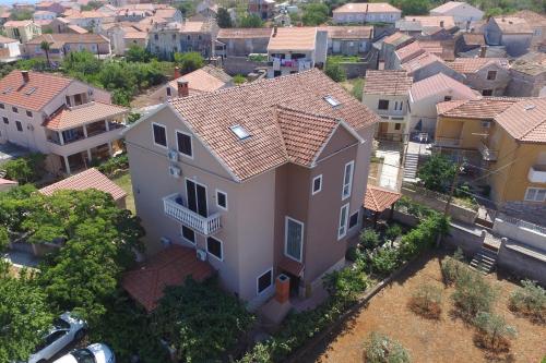 an overhead view of a house in a city at Apartments by the sea Kukljica, Ugljan - 8253 in Kukljica