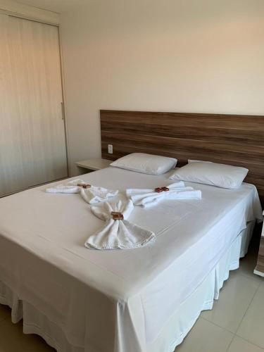 Ένα ή περισσότερα κρεβάτια σε δωμάτιο στο Lençois Flat 101