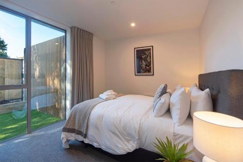 Letto o letti in una camera di Malthouse Lane City Apartment 2