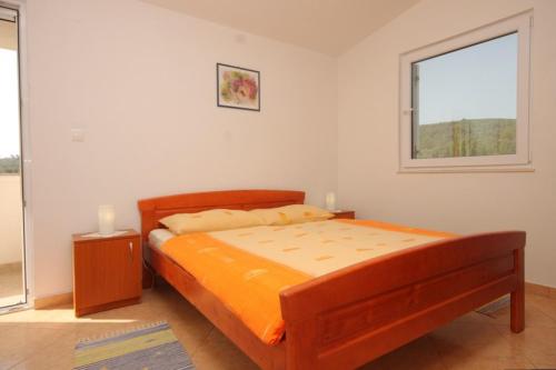 Postel nebo postele na pokoji v ubytování Apartments by the sea Zdrelac, Pasman - 8285