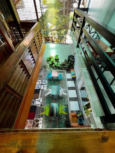 an overhead view of a room with plants on the floor at Balay Paragua in El Nido