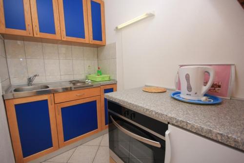 Kuchyň nebo kuchyňský kout v ubytování Apartments with a parking space Kraj, Pasman - 8259