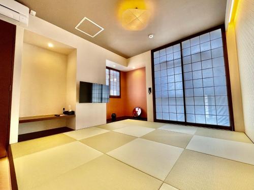Televisyen dan/atau pusat hiburan di ホテル天使館 久茂地 -Tenshi-Kan-