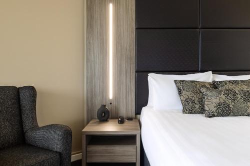 Postel nebo postele na pokoji v ubytování Rydges South Park Adelaide