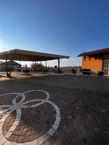a design on the ground in a patio at Mamaral in Agerola