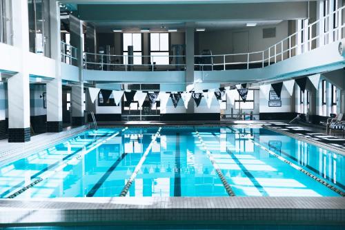 a large swimming pool in a building at Los Angeles Athletic Club in Los Angeles