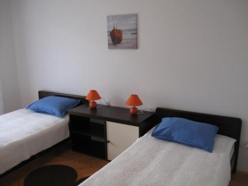 Postel nebo postele na pokoji v ubytování Apartments with a parking space Brodarica, Sibenik - 11262