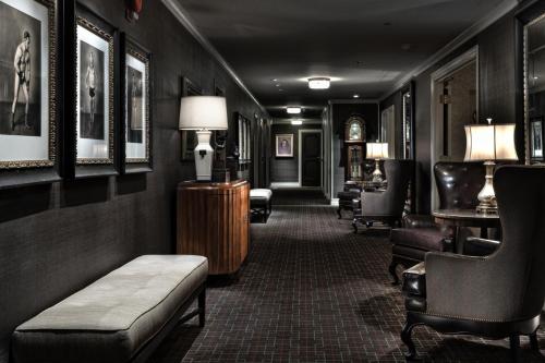 a hotel hallway with chairs and a waiting room at Los Angeles Athletic Club in Los Angeles