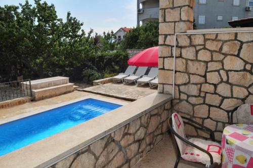 Seaside apartments with a swimming pool Supetar, Brac - 11360