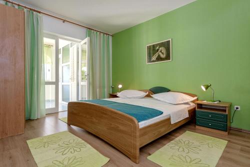 เตียงในห้องที่ Apartments with a parking space Stari Grad, Hvar - 8726