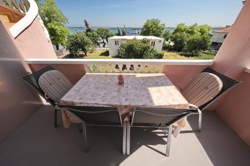 A balcony or terrace at Apartments by the sea Tkon, Pasman - 8414