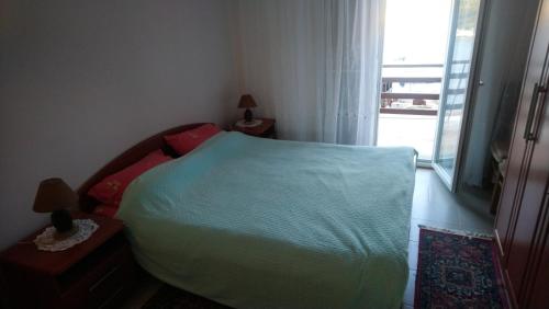 Postel nebo postele na pokoji v ubytování Apartment Zaklopatica 8341c