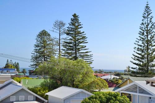 a view of a suburb with houses and trees at Cool and Calm - Bring your own linen in South West Rocks