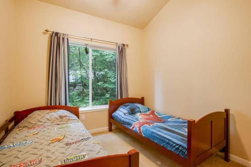 Llit o llits en una habitació de Mount Rainier Retreat