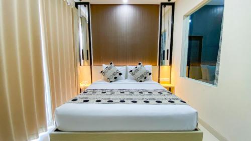 Postel nebo postele na pokoji v ubytování Ultimate Residence Bali