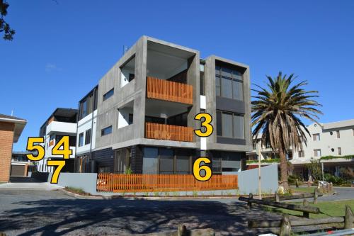 a building with the numbers and on it at Waterford Apartment 5 in South West Rocks