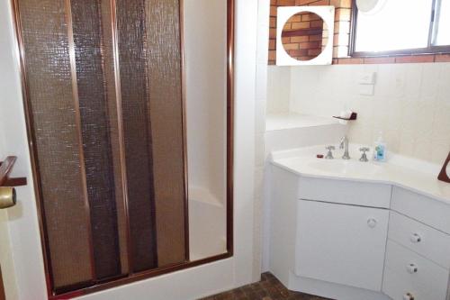 a bathroom with a shower and a sink at Cameo Court Unit 7 South West Rocks in South West Rocks