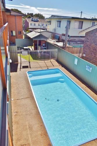 a swimming pool on the roof of a building at Cameo Court Unit 7 South West Rocks in South West Rocks