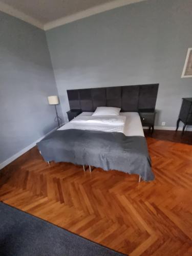 Ένα ή περισσότερα κρεβάτια σε δωμάτιο στο Apartamenty Duo