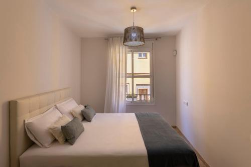Cama o camas de una habitación en Bonito Nice apartamento Sevilla centro