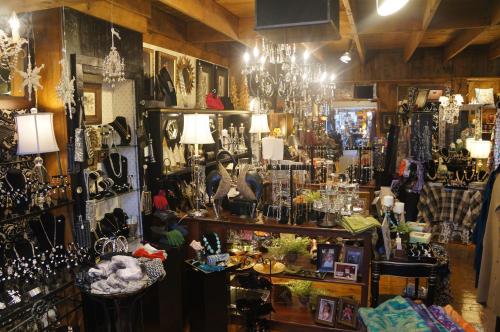a store filled with lots of glasses and chandeliers at Greenbrier Inn Killington in Killington