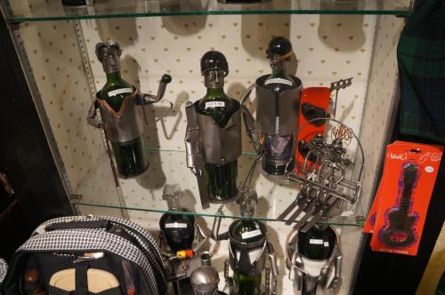 a glass shelf with some bottles on it at Greenbrier Inn Killington in Killington