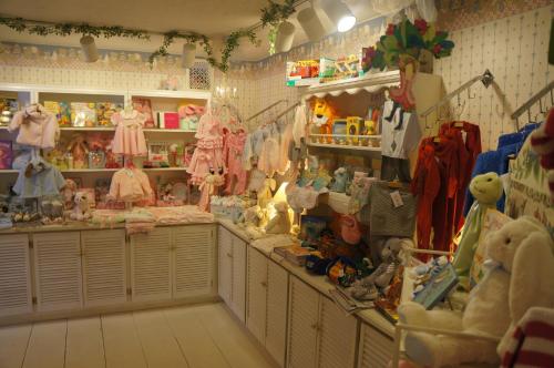 a store filled with lots of stuffed animals and toys at Greenbrier Inn Killington in Killington