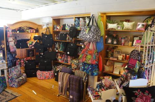 a store filled with lots of bags and other items at Greenbrier Inn Killington in Killington