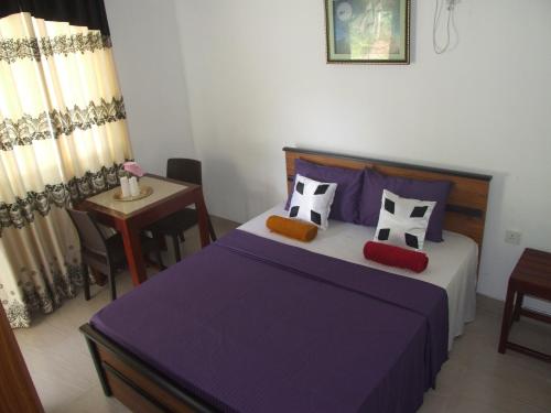 Postel nebo postele na pokoji v ubytování Paradise inn