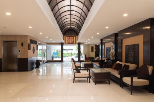 Χώρος καθιστικού στο Boss Suites Nana Hotel