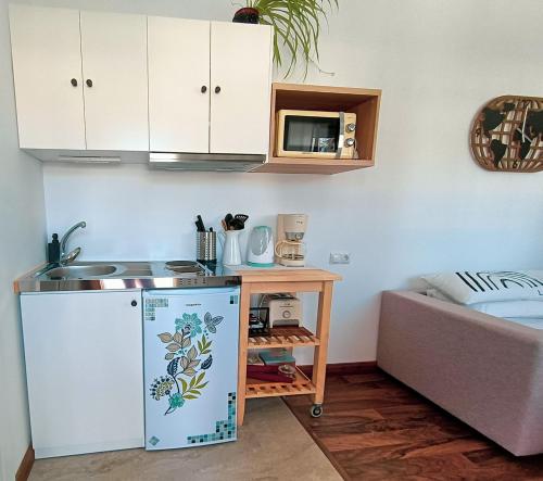 a kitchen with a sink and a counter top at Villacarmen Suite in Benalmádena
