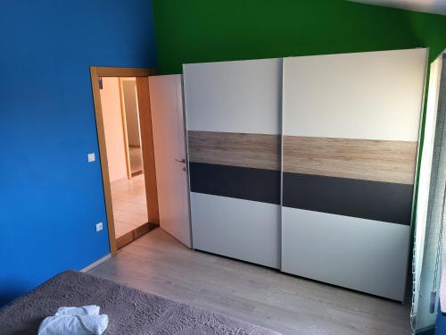Postel nebo postele na pokoji v ubytování Apartment Leonardo