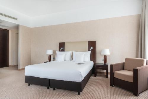  Hotel Polonia Palace -  Room  picture :    Tea/Coffee maker    Safety deposit box    TV                            