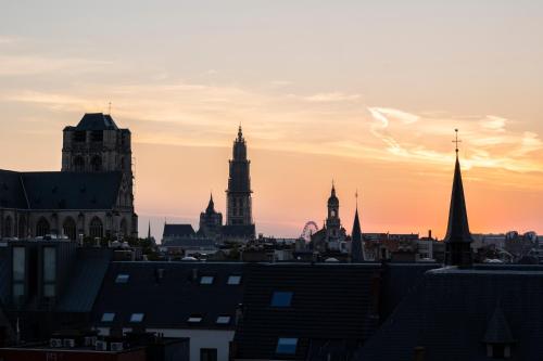 a view of a city skyline at sunset at Citybox Antwerp in Antwerp