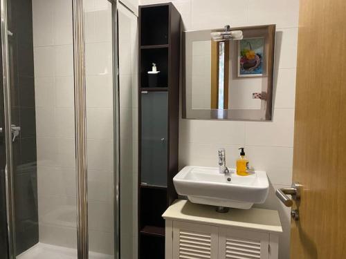 Ένα μπάνιο στο Apartamento playa de Bueu