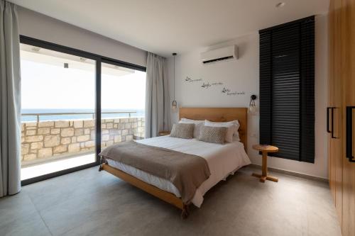 Ένα ή περισσότερα κρεβάτια σε δωμάτιο στο Villa Auretta