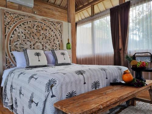 Postel nebo postele na pokoji v ubytování Stay at My Place Bali