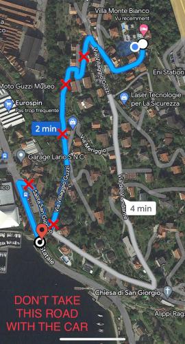 a map of the road with the car on it at Villa Monte Bianco in Mandello del Lario