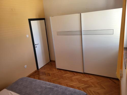 Postel nebo postele na pokoji v ubytování Apartment Leonardo