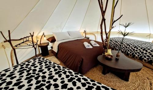 Postel nebo postele na pokoji v ubytování Finca de la Vaca - Glamping