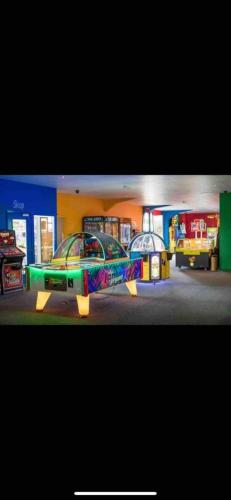 a room with a car on display in a store at Yogi's Space in Birchington