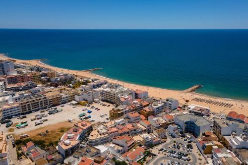 1BR Infante Flat in Quarteira by LovelyStay