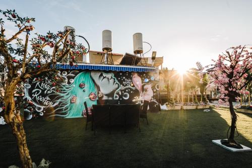 a building with a mural on the side of it at King's rooftop in Tel Aviv