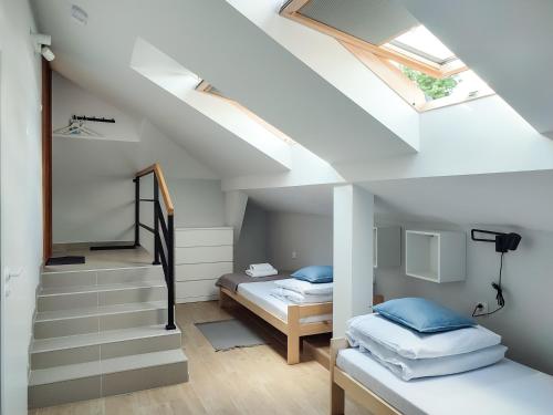 Postel nebo postele na pokoji v ubytování Apart Hostel S8