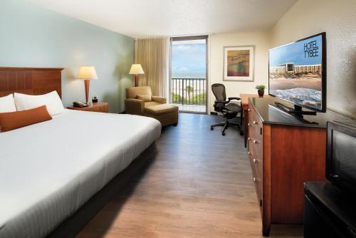 Ένα ή περισσότερα κρεβάτια σε δωμάτιο στο Hotel Tybee