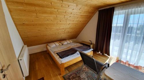 Postel nebo postele na pokoji v ubytování Mandula Apartmanok