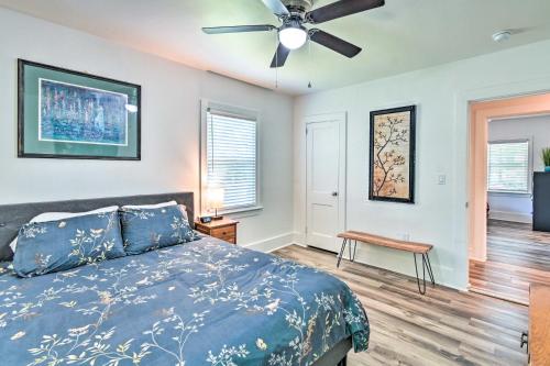 a bedroom with a bed and a ceiling fan at Pet-Friendly Fayetteville Home with Fenced Yard in Fayetteville