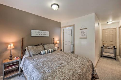 a bedroom with a large bed and a door at Cozy Garden Room in Welsh Mountain Suites! in New Holland