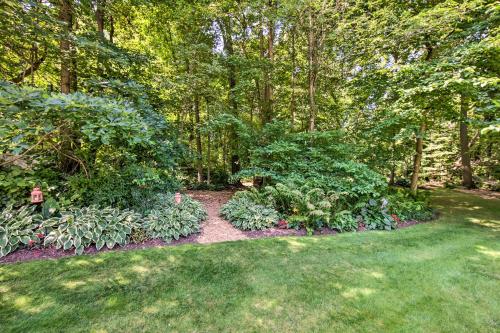 a garden with plants and flowers in a yard at Cozy Garden Room in Welsh Mountain Suites! in New Holland