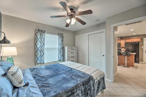 a bedroom with a bed and a ceiling fan at Laguna Vista Home with Resort Perks Near Beach! in Laguna Vista